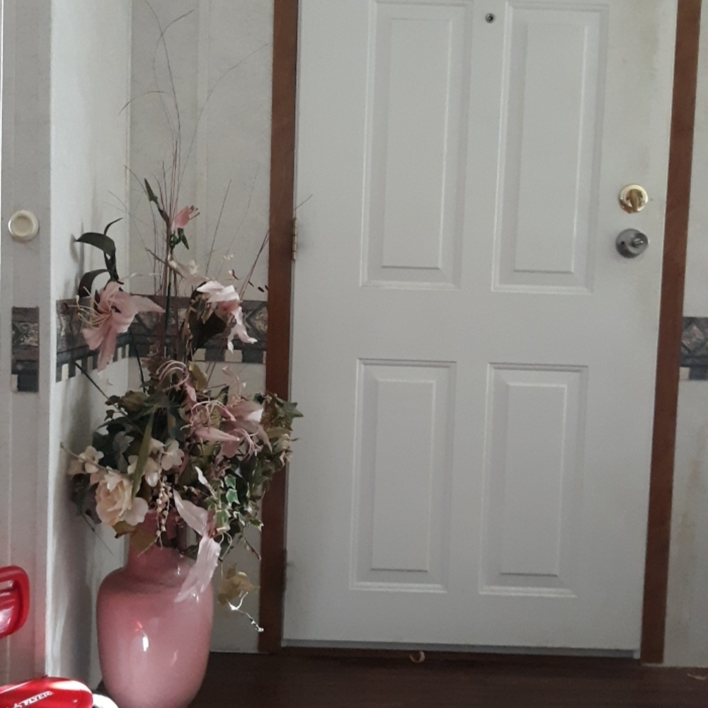 Ceramic vase with faux lilies